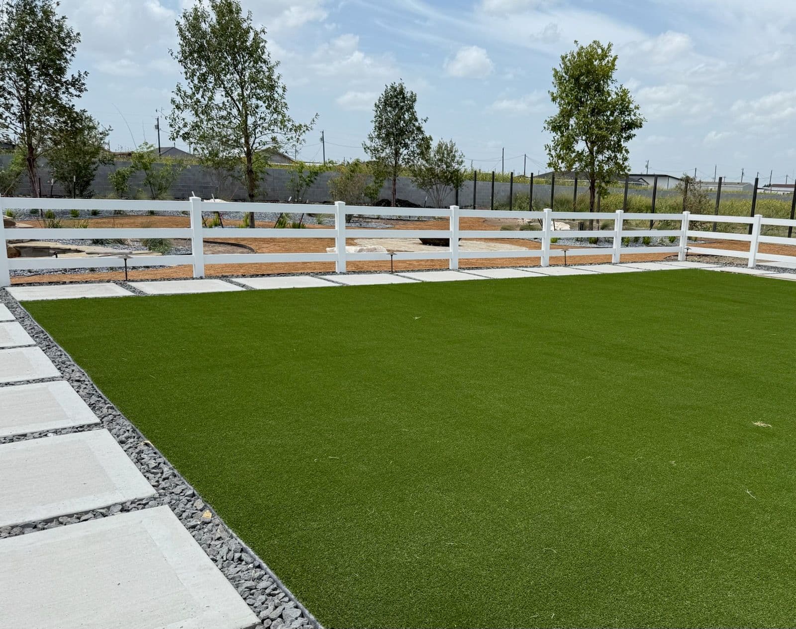 Stylish Durable 3 Rail Vinyl Fence Installed image